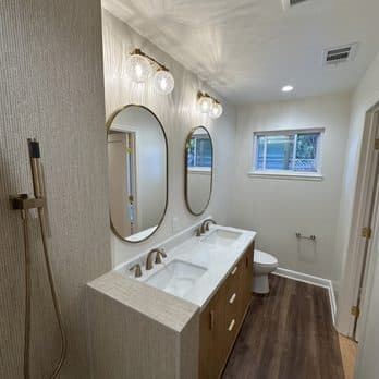 Double Vanity Bathroom with Brass Fixtures