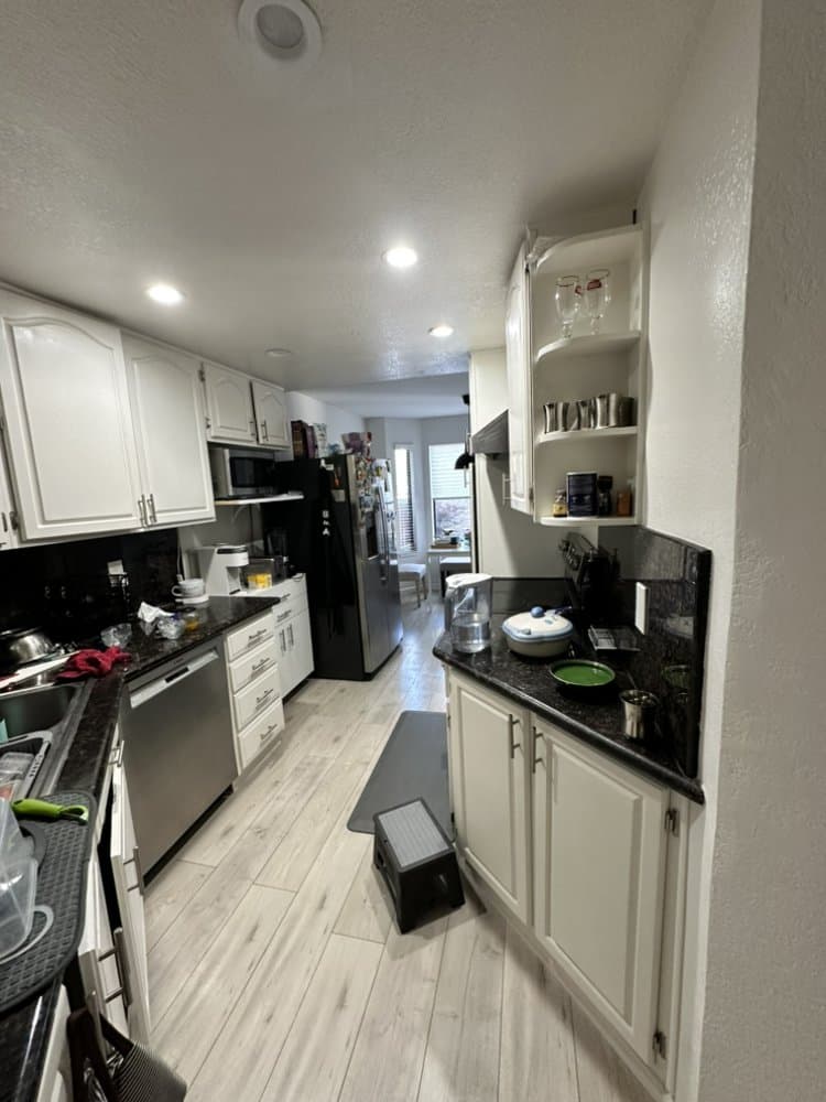 Kitchen Update with White Cabinets & Black Countertops